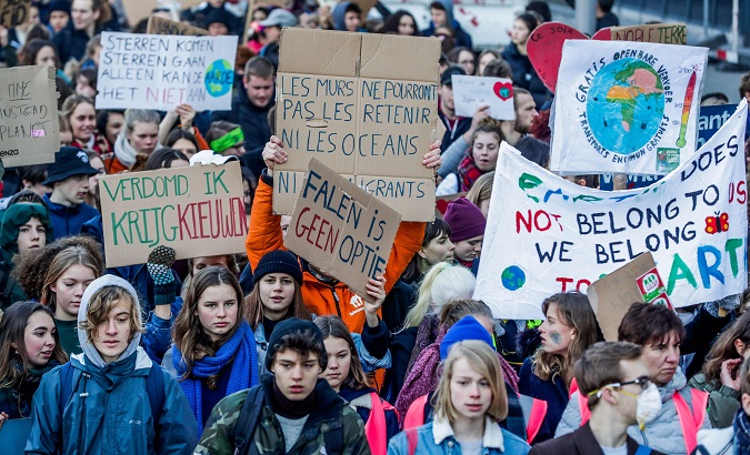 Belgian students protesting, to demand urgent measures to combat climate change, in Brussels.