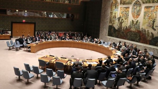 Members of the United Nations Security Council gather during a meeting about the situation in Venezuela, in New York.