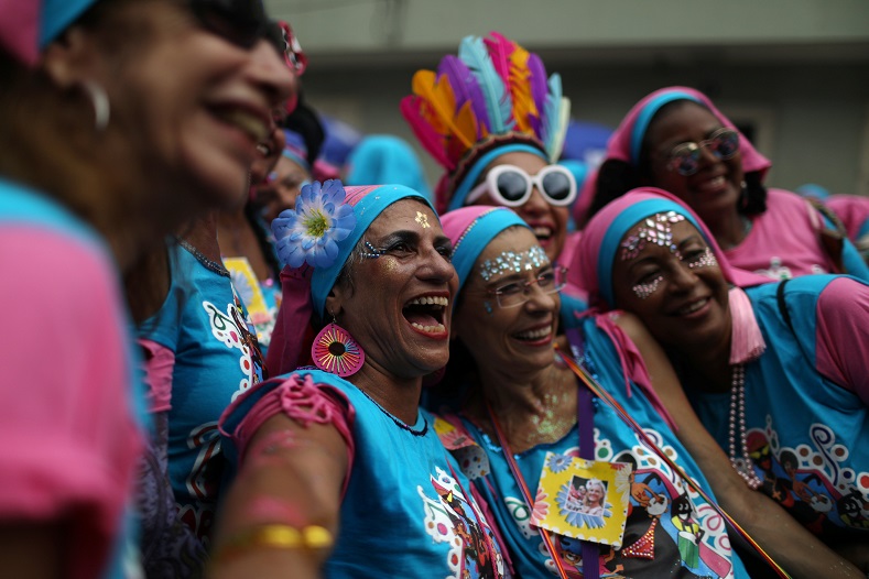 Women come together for a group photo during celebrations during Brazil's most famous holiday.