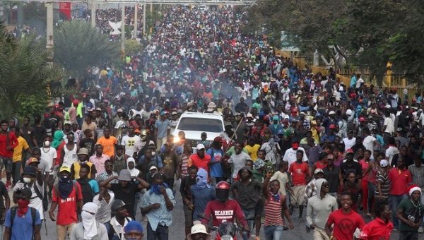 Demonstrators participate in an anti-government protest in Port-au-Prince, Haiti, February 12, 2019.