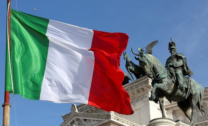 The Italian flag waves in front of The 
