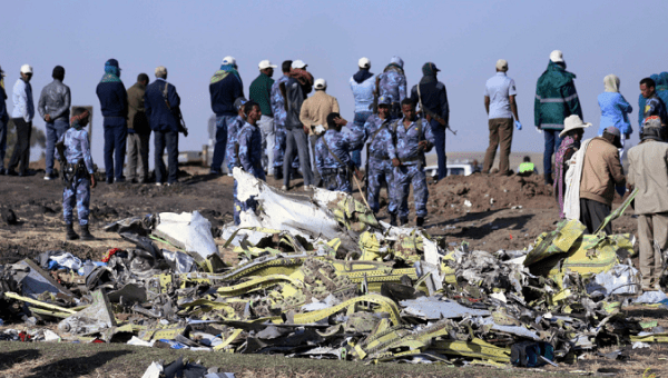 Ethiopian Federal policemen at the scene of the Ethiopian Airlines Flight ET 302 plane crash southeast of Addis Ababa, Ethiopia March 11, 201