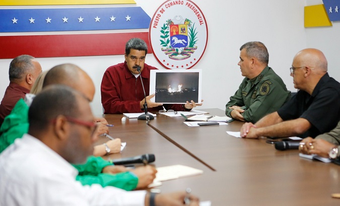 Venezuela's President Nicolas Maduro speaks during a meeting with members of the government in Caracas, Venezuela March 12, 2019.