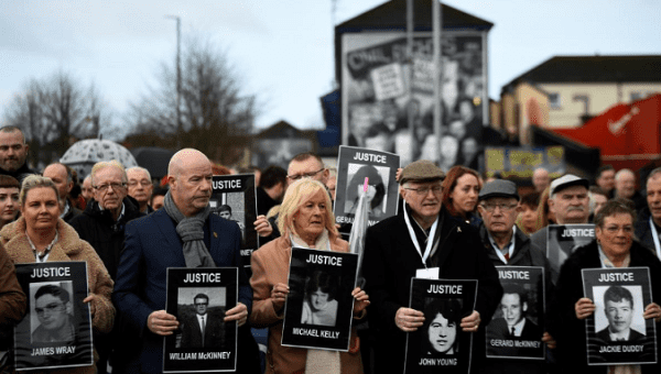 Families of the victims walk through the Bogside before the announcement of the decision whether to charge soldiers involved in the Bloody Sunday events, in Londonderry, Northern Ireland March 14, 2019.