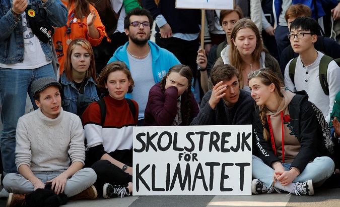 Greta Thunberg (C) takes part in a protest in Paris, France, Feb. 22, 2019.