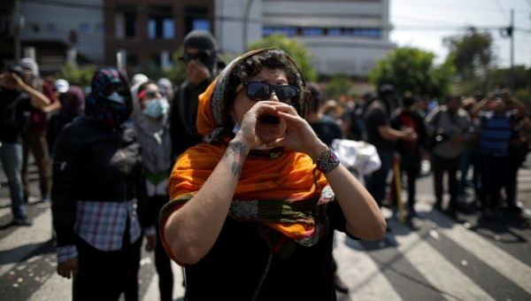A protester participates in a demonstration against a water regulation bill, which is believed might lead to the privatisation of water supplies, in San Salvador, El Salvador March 20, 2019.