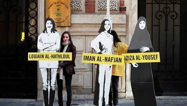 Demonstrators from Amnesty International stage the protest on International Women's day to urge Saudi authorities to release jailed women's rights activists, France, March 8, 2019.