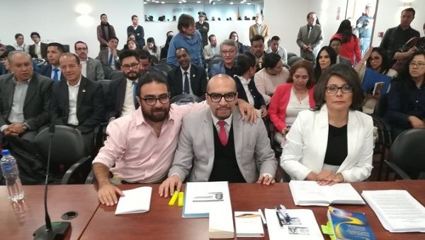 Felipe Ogaz (left) and Richard Gonzalez (right) presented the protection order against 152 officials, including Lenin Moreno. 
