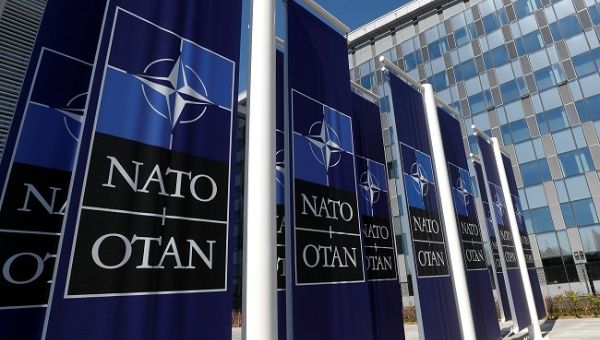 Banners displaying the NATO logo are placed at the entrance of new NATO headquarters during the move to the new building, in Brussels, Belgium April 19, 2018. 