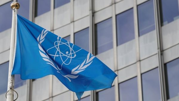 The flag of the International Atomic Energy Agency (IAEA) flutters in front of their headquarters in Vienna, Austria March 4, 2019.