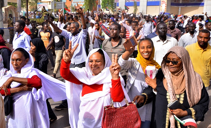 Demonstrators chant slogans along the streets after Sudan's Defense Minister Awad Mohamed Ahmed Ibn Auf said that President Omar al-Bashir had been detained in Khartoum, Sudan April 11, 2019.