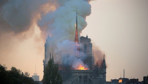 Smoke billows from Notre Dame Cathedral after a fire broke out, in Paris, France April 15, 2019. 