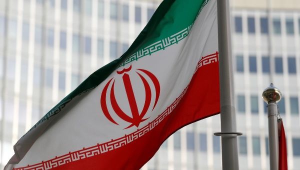 The Iranian flag flutters in front the International Atomic Energy Agency (IAEA) headquarters in Vienna, Austria March 4, 2019. 