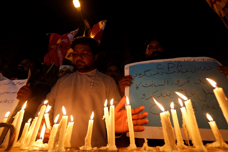 People light candles for the victims of Sri Lanka's serial bomb blasts, in Karachi, Pakistan April 21, 2019