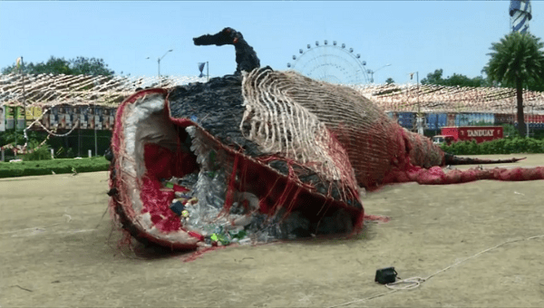 The art installation depicting a dead, pregnant whale, is made entirely of garbage.