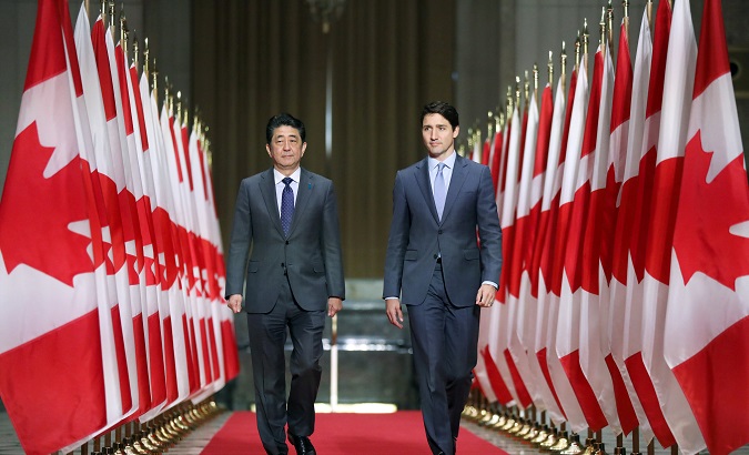 Japan's Prime Minister Shinzo Abe and Canada's Prime Minister Justin Trudeau arrive at a news conference in Ottawa, Ontario, Canada, April 28, 2019.