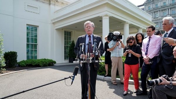 White House national security adviser Bolton talks about Venezuela outside White House in Washington.