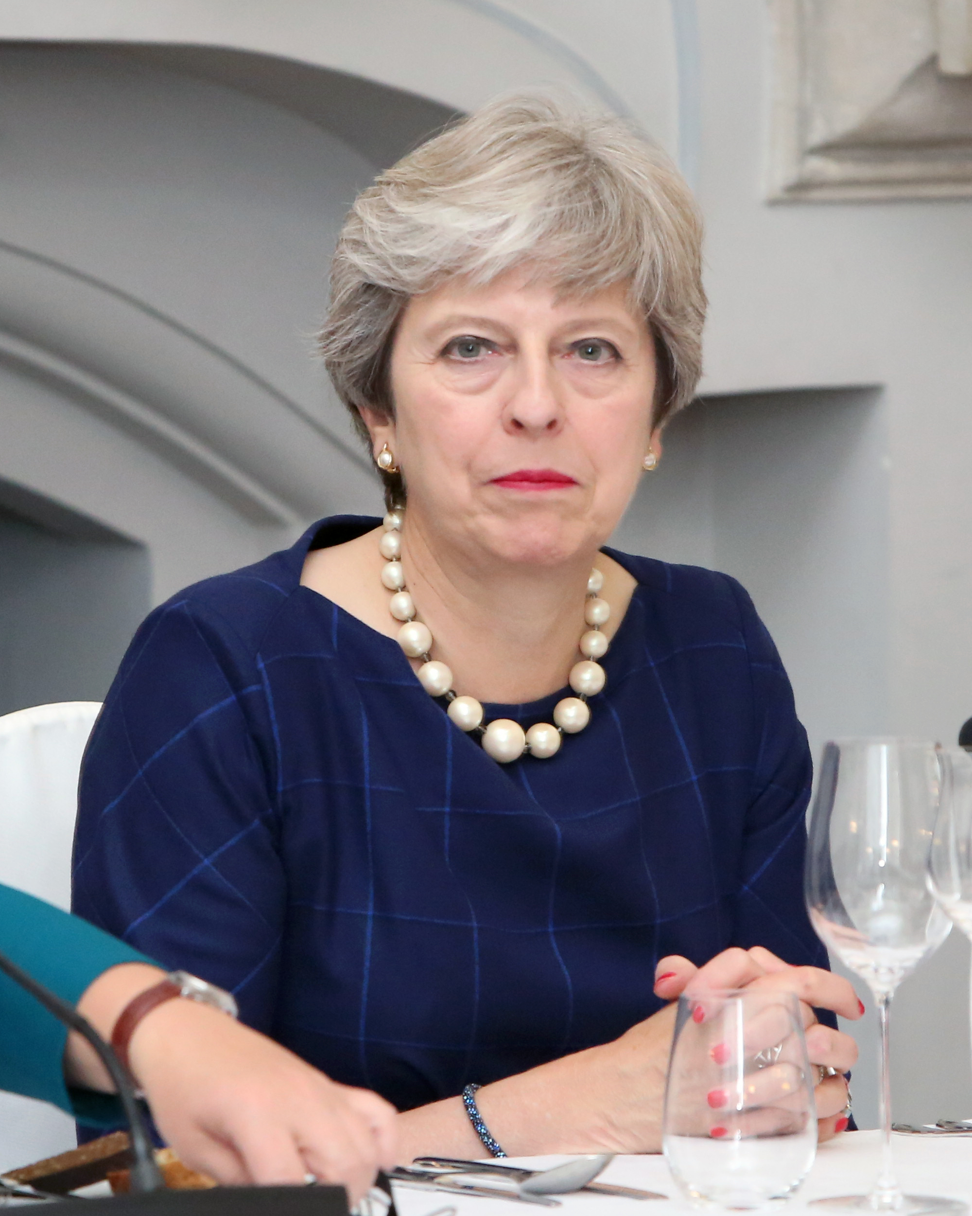 Theresa May looking glum.