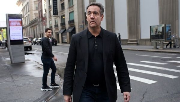 Michael Cohen, the former lawyer for U.S. President Donald Trump, walks to his apartment in Manhattan in New York