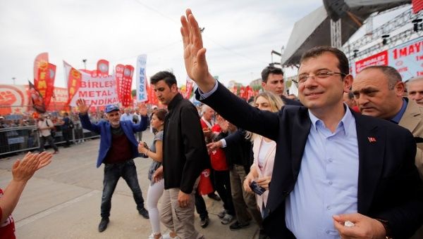 Mayor of Istanbul Ekrem Imamoglu of the main opposition CHP greets people during a May Day rally in Istanbul.