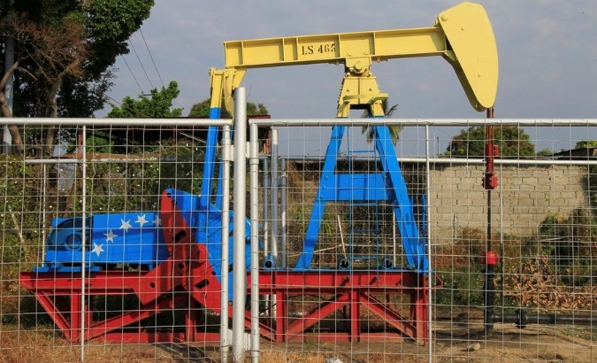 An oil pumpjack painted with the colors of the Venezuelan flag is seen in Lagunillas, Venezuela January 29, 2019.
