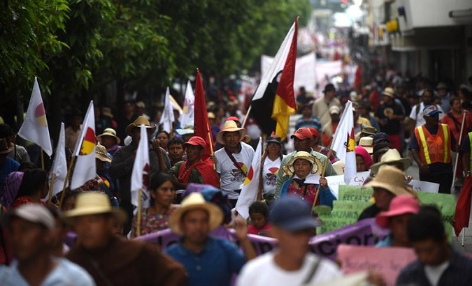 Indigenous people in Guatemala protesting against the corrupted ruling elite.