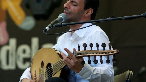 Palestinian band Le Trio Joubran playing at a music festival.