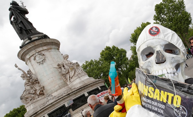 Protesters gather to demonstrate against Bayer Monsanto at the Republic Square in Paris, France, May 18, 2019.