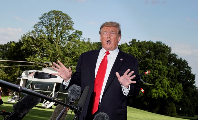 U.S. President Donald Trump speaks to the media as he departs for a campaign rally from the White House in Washington, U.S., May 20, 2019