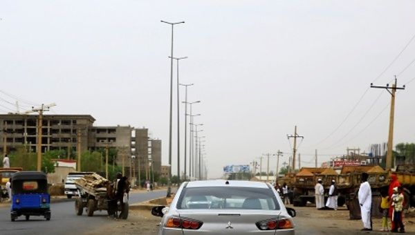 Traffic flows are seen along a street in Khartoum
