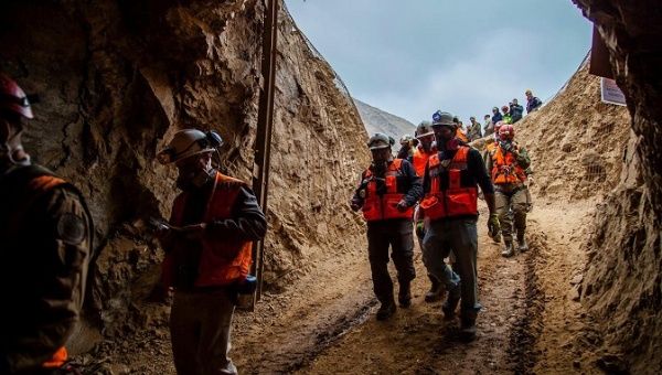 Search and rescue teams work to rescue Bolivian workers trapped in a mine in Tocopilla, Chile, June 14, 2019