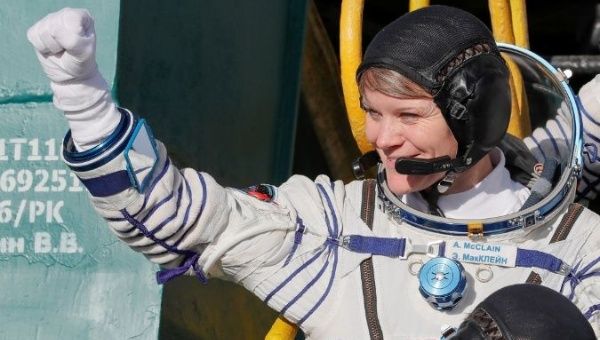 Astronaut Anne McClain is one of the top choices for the Artemis program, a plan to land the 1st woman on the moon. 