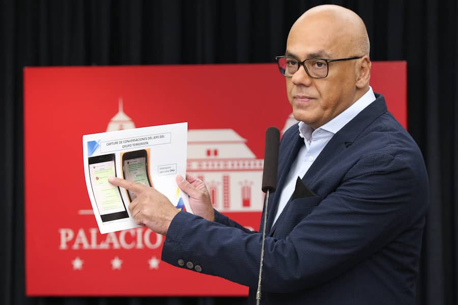 Jorge Rodríguez speaks at a press conference, revealing documents and photos of corruption actions carried out by Juan Guaido and his allies.