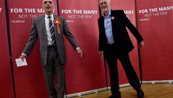 Labour Party MP Chris Williamson (L) and party leader, Jeremy Corbyn (R)