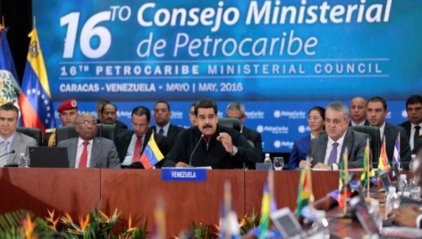 President Nicolas Maduro (C) speaks during the 16th PetroCaribe Ministerial Council in Caracas May 27, 2016.
