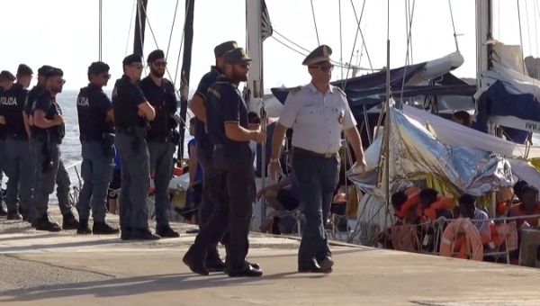 The 'Alex' crew docks in Italy, but on arrival, all on board refused to disembark and surrender to police.
