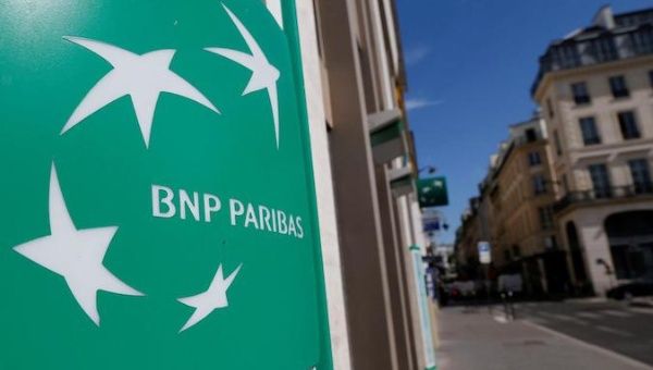 A BNP Paribas logo is seen outside a bank office in Paris, France, August 6, 2018.