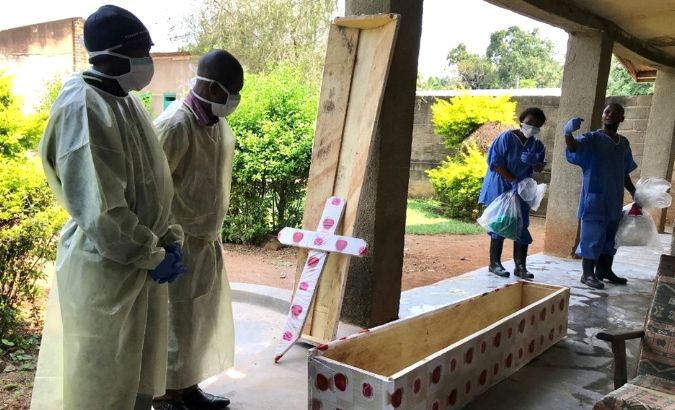 Health workers at Mangina hospital prepare to conduct a safe burial, in Beni, Democratic Republic of Congo, August 15, 2018.