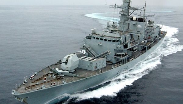 U.K. warship performs a series of tight turns off the coast of Oman.