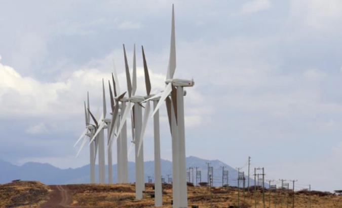 Three hundred sixty-five turbines spin carelessly in the wind along Lake Turkana.