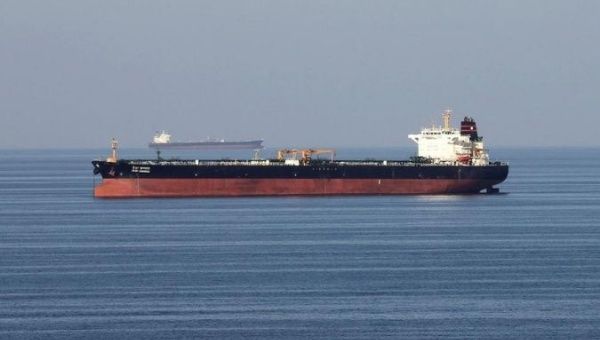 An unidentified oil tankers pass through the Strait of Hormuz. 