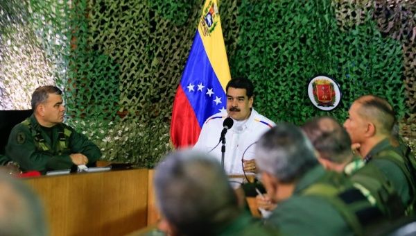 President Maduro with the military high-command on Wednesday.