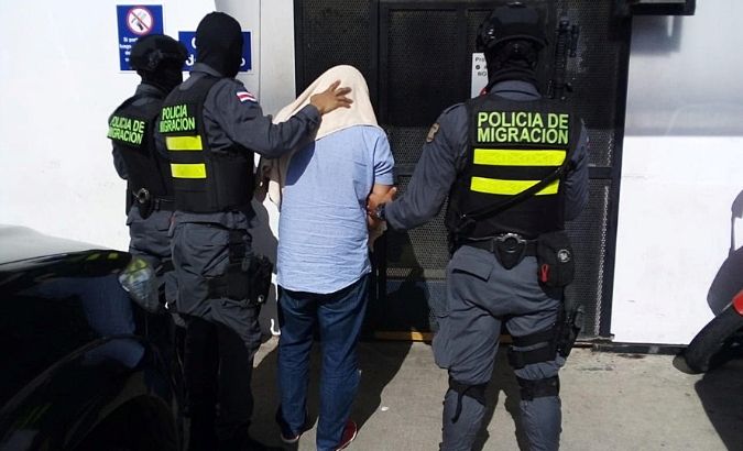 Migration police detain a person suspected of belonging to an international network for migrant trafficking, in La Cruz, Costa Rica July 30, 2019.