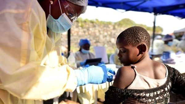  Congolese health worker administers ebola vaccine to a child at the Himbi Health Centre in Goma.