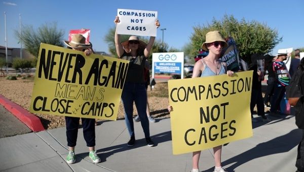 People protest outside the ICE immigration detention center in Adelanto, California, U.S., August 8, 2019. 