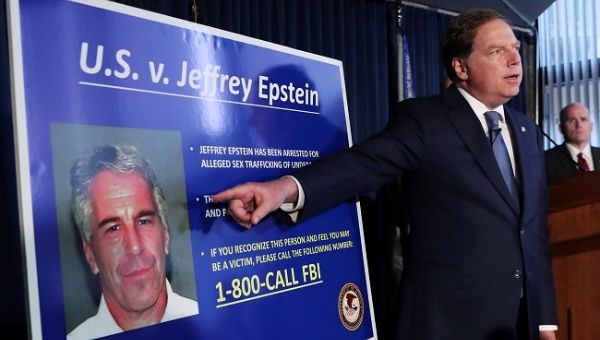 Geoffrey Berman, United States Attorney for the Southern District of New York, points to a photograph of Jeffrey Epstein as he announces the financier's charges of sex trafficking of minors and conspiracy to commit sex trafficking of minors, in New York, U.S., July 8, 2019. 