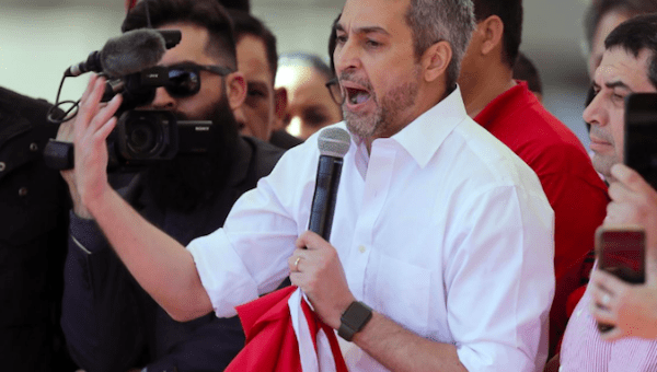 Paraguay's President Mario Abdo Benitez gestures as he meets supporters in Asuncion, Paraguay, August 13, 2019.