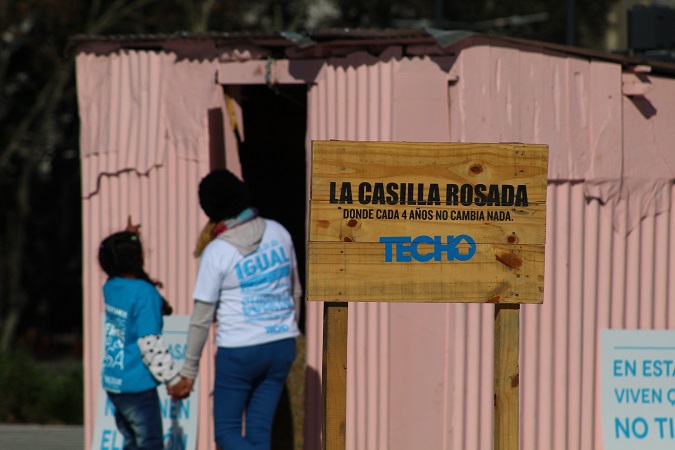An example of the type of dwellings where the poor live in Buenos Aires, Argentina, August 16, 2019. The sign reads, 'The Pink Little House, where every 4 years nothing changes'.