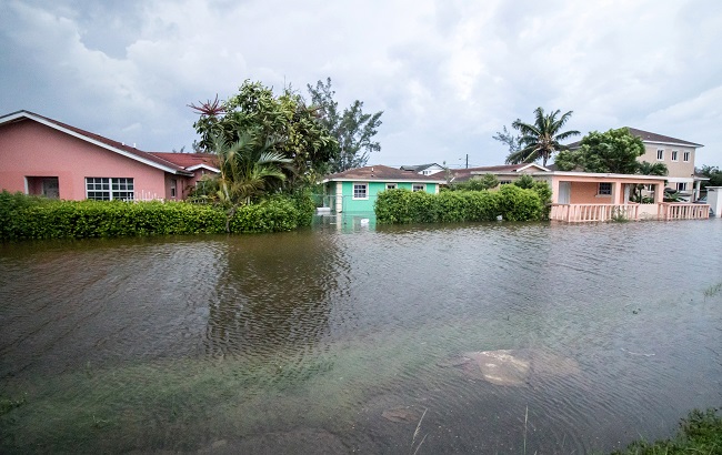 Houses line a flooded street after the effects of Hurricane Dorian arrived in Nassau, Bahamas, September 2, 2019.
