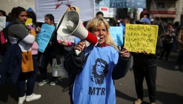 A woman in a protest against the government’s economic measures in Buenos Aires, Argentina, Sep. 4, 2019. 